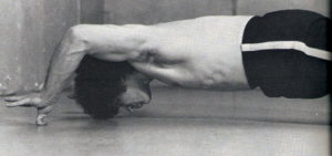 Jim Arvanitis performing one of his famous thumb pushups, which he can also do with one thumb